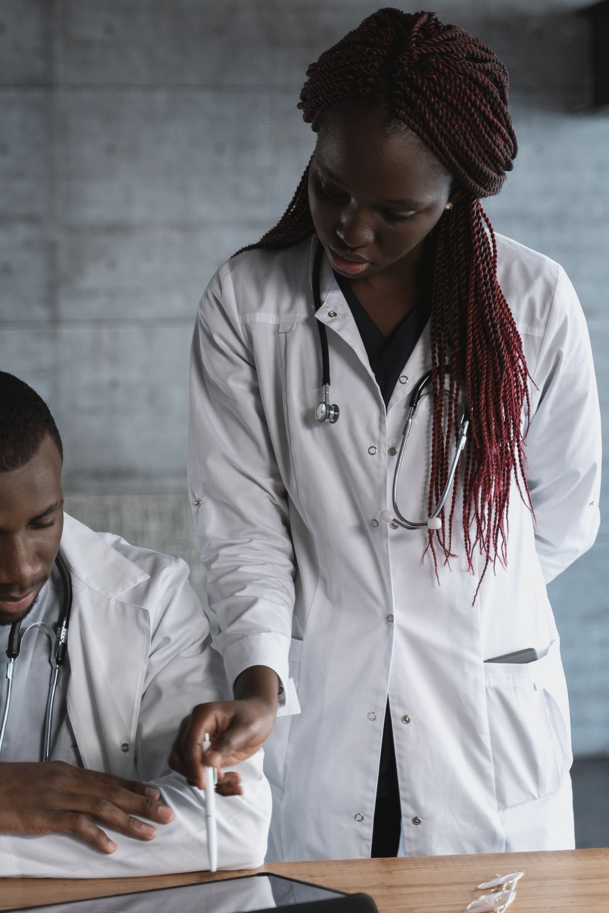 Clinicians working together during patient care